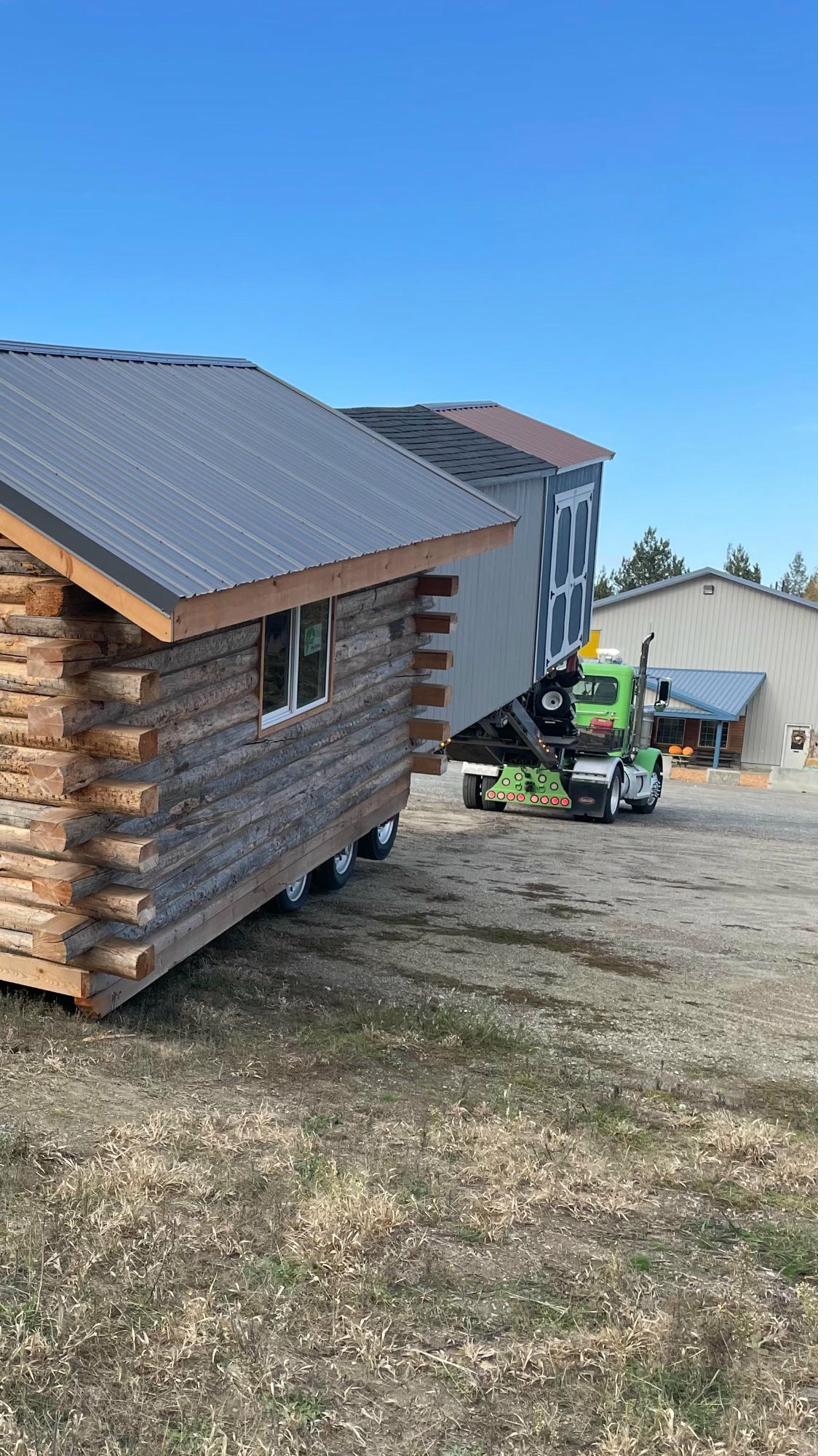 SGA cabin being hauled and delivered
